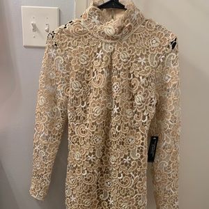 Venus gold dress size is 4 new.